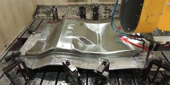 A 3D-printed facesheet being machined at Baker Industries, a Lincoln Electric Company
